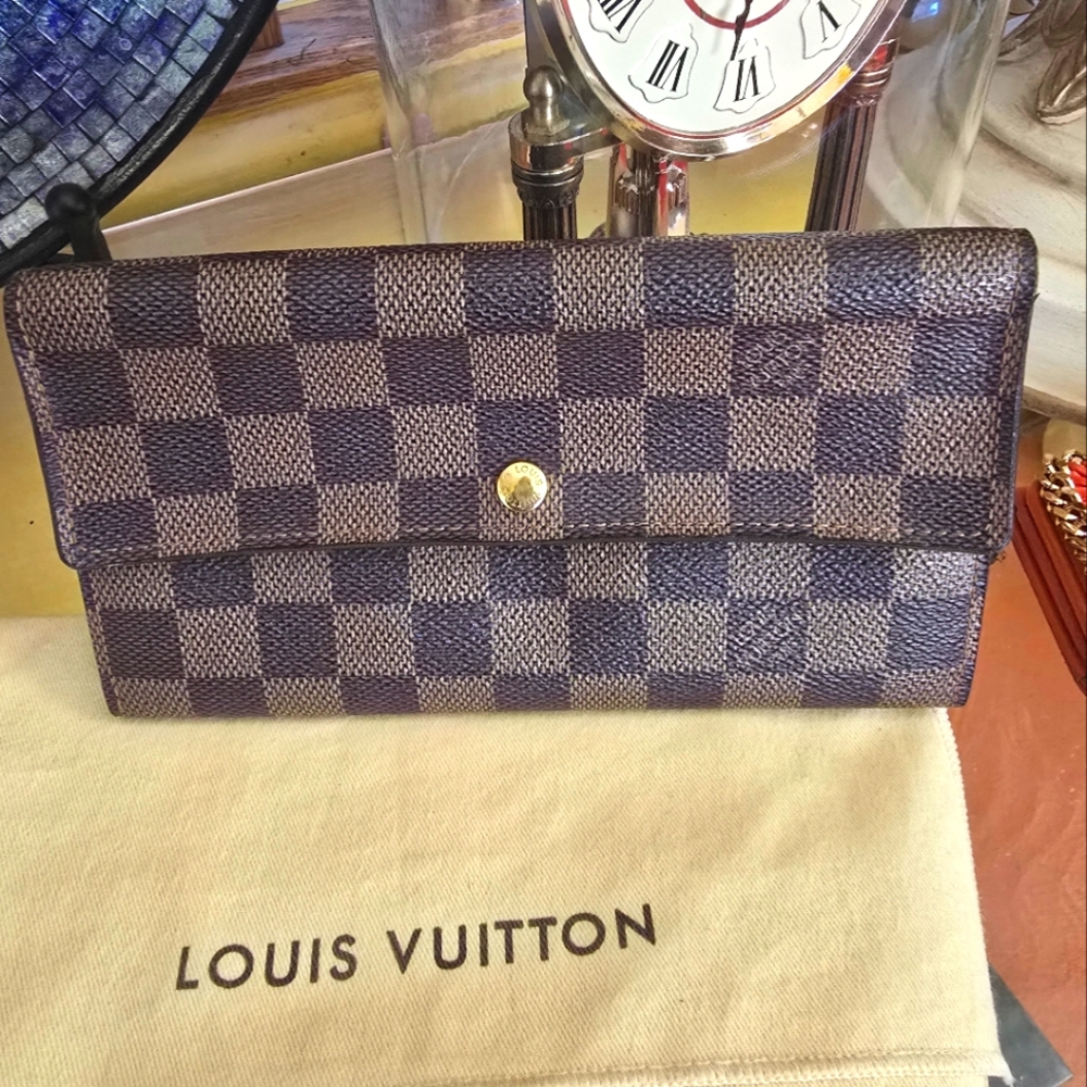 Louis Vuitton Damier Ebene Sarah wallet.